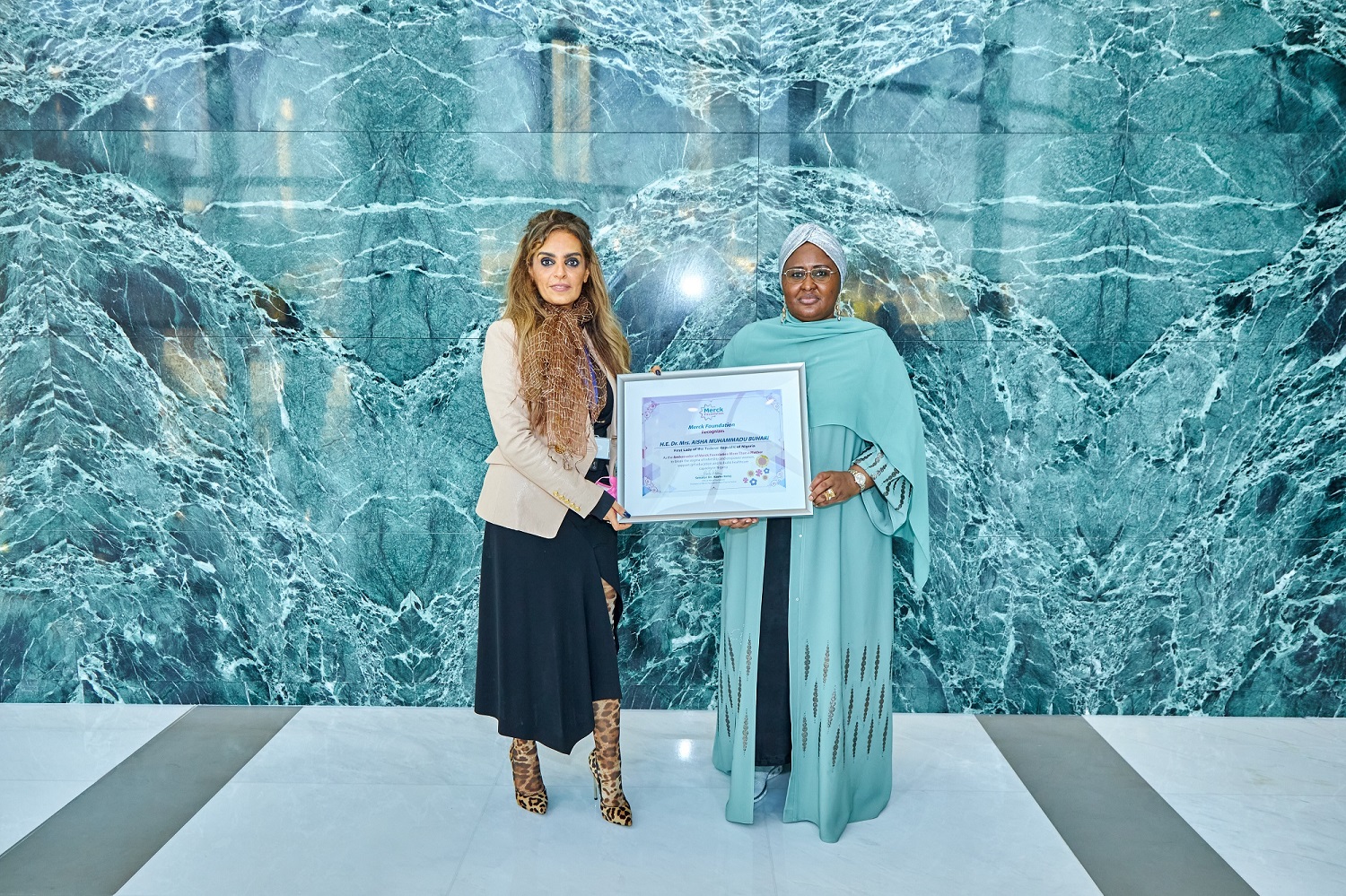 Senator Dr Rasha Kelej CEO of Merck Foundation and President of More Than a Mother and HE Dr Mrs AISHA MUHAMMADU BUHARI The First Lady of Nigeria and Ambassador of Merck Foundation More Than a Mother