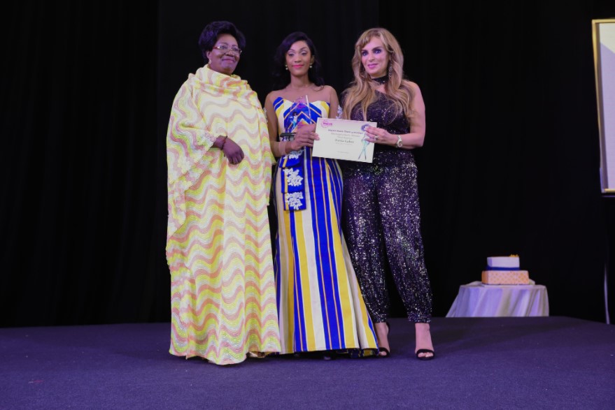 Dr. Rasha Kelej, CEO of Merck Foundation and H.E. BRIGITTE TOUADERA, The First Lady of Central African Republic presenting the MMTM Ghana Media Recognition ? Multimedia Award ? Joint Second Prize to Portia Gabor