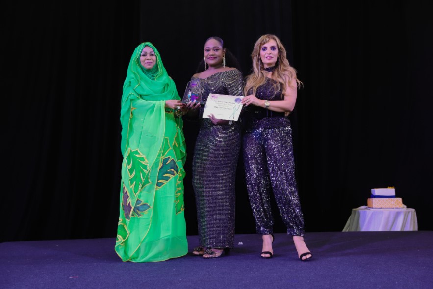 Dr. Rasha Kelej, CEO of Merck Foundation and H.E. HINDA D?BY ITNO, First Lady of Chad presenting the MMTM Ghana Media Recognition ? Multimedia Award ? Joint First Prize to Akua Oforiwa Darko